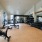 	Apartments for Rent in Camas- Ninebark- Virtually Staged Image of Fitness Center with Carpeting and Floor-to-Ceiling Windows