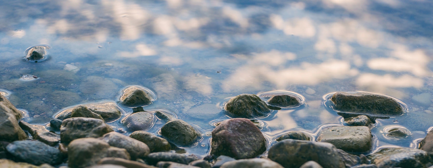 Closeup of pebbles on the lake shore 